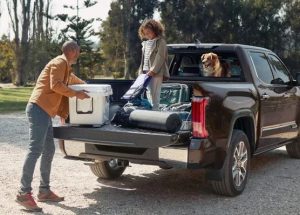 A family on an outdoor trip with their 2023 Toyota Tundra near Noblesville, Indiana.