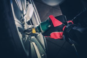 A mechanic performing a tire rotaiton at a service center near Noblesville, Indiana.
