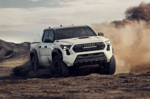 A 2024 Toyota Tacoma driving off-road near Noblesville, Indiana