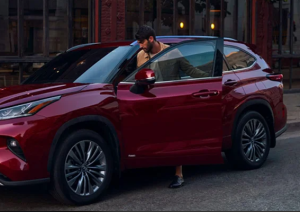 A person getting into their 2024 Toyota Highlander Hybrid near Noblesville, Indiana