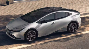 A silver 2024 Toyota Prius parked next to a curb on a street near Noblesville, Indiana