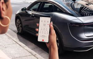 A person using their phone app to connect to their 2024 Toyota Crown near Noblesville, Indiana