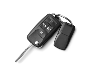 A set of car keys placed on a white surface near Noblesville, Indiana