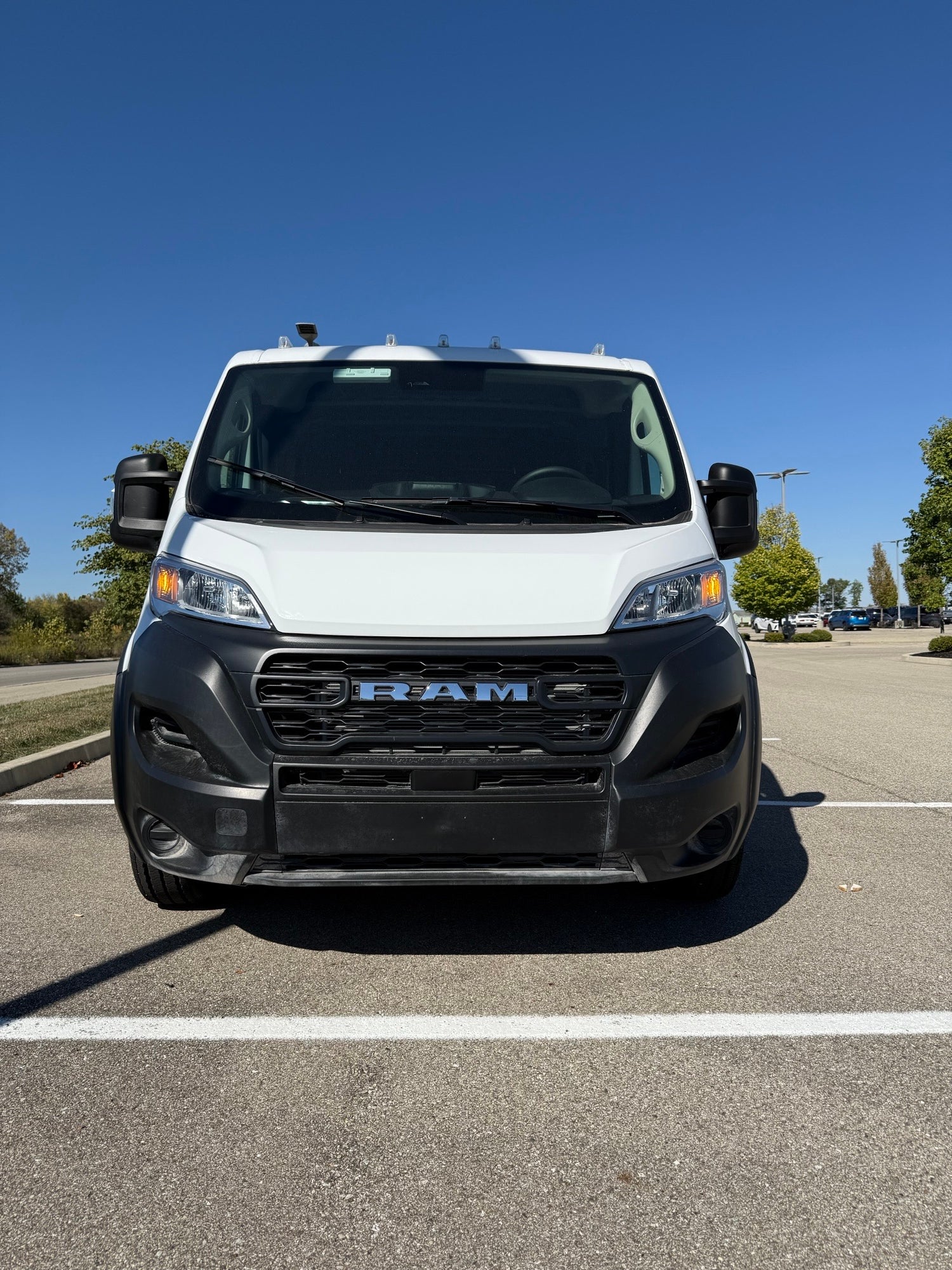Front view of white Ram ProMaster 1500 van