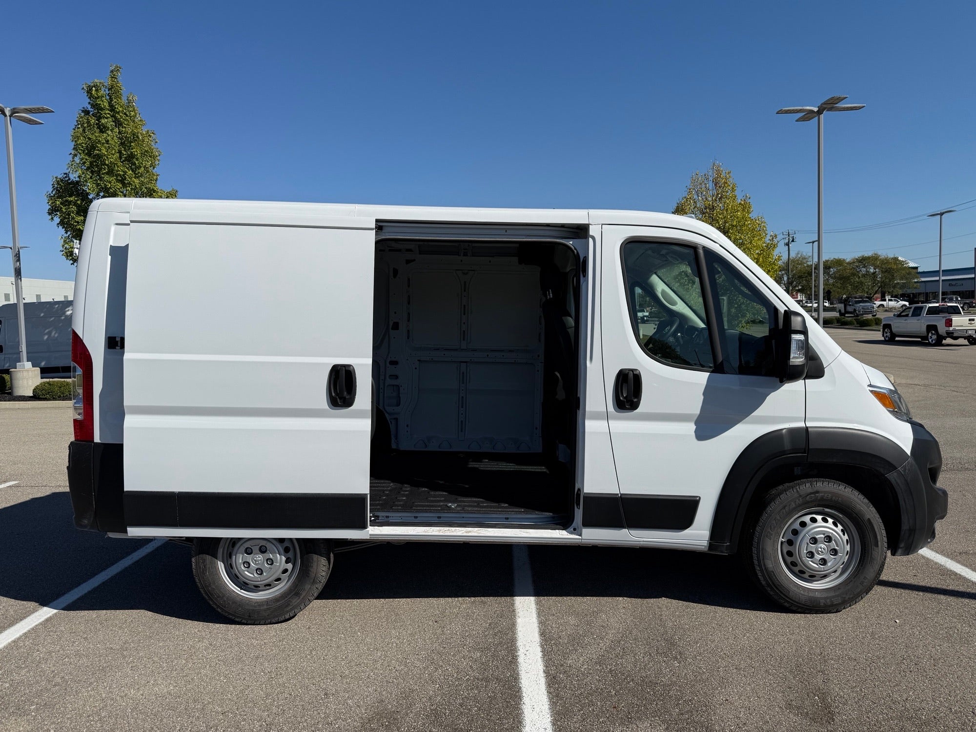 Side view of Ram ProMaster 1500 with open sliding door