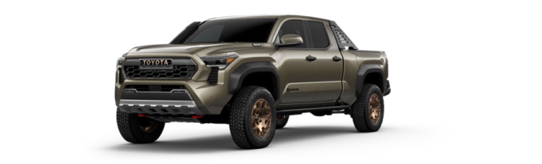 Bronze Toyota Tacoma Trailhunter pickup, front three-quarter view