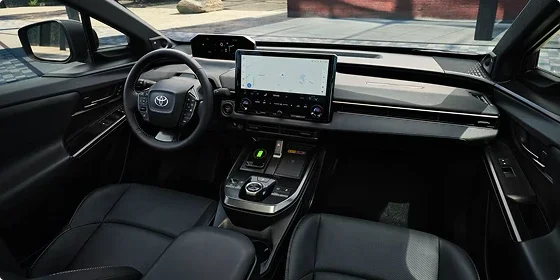 Interior of the 2026 Toyota bZ Limited AWD with the 14-inch Toyota Audio Multimedia touchscreen