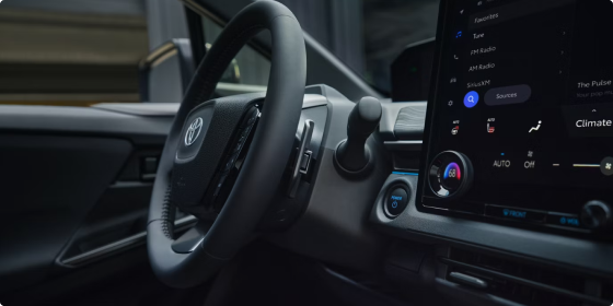 Steering wheel and 14-inch Toyota Audio Multimedia touchscreen in the 2026 Toyota C-HR XSE AWD