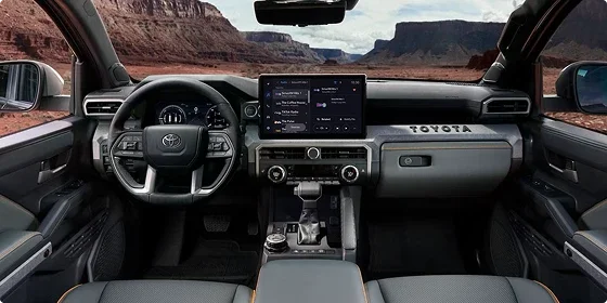 Interior of the 2026 Toyota Tacoma SR5 4x4 with the 8-inch Toyota Audio Multimedia touchscreen